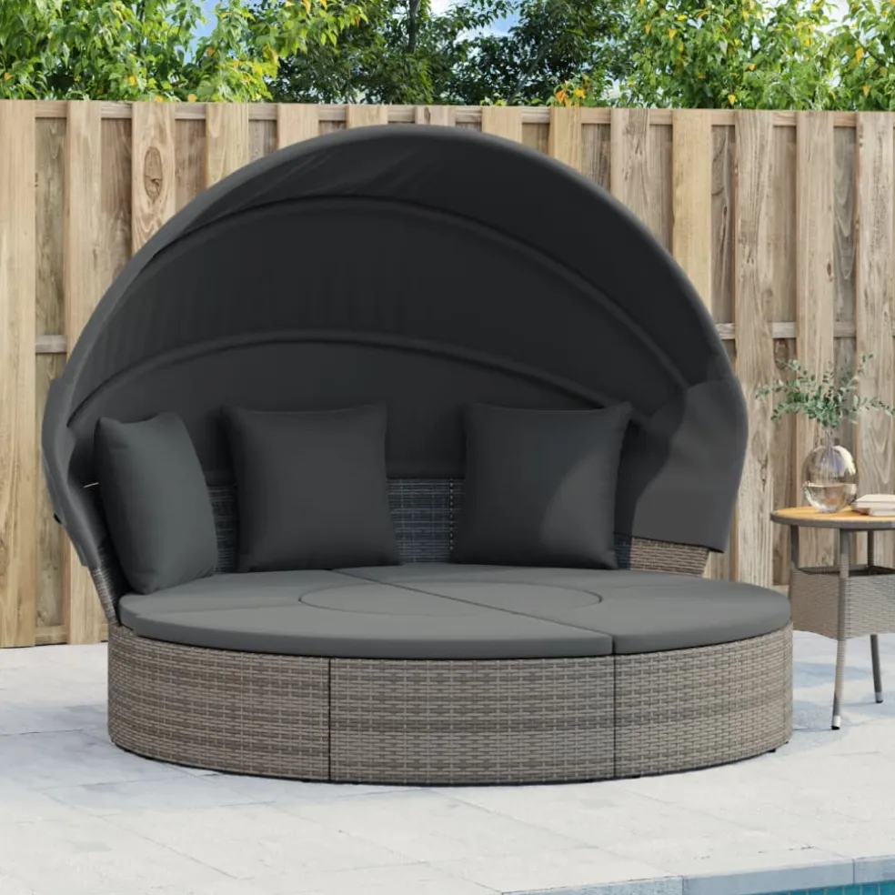 vidaXL Loungebed met luifel en kussens poly rattan grijs