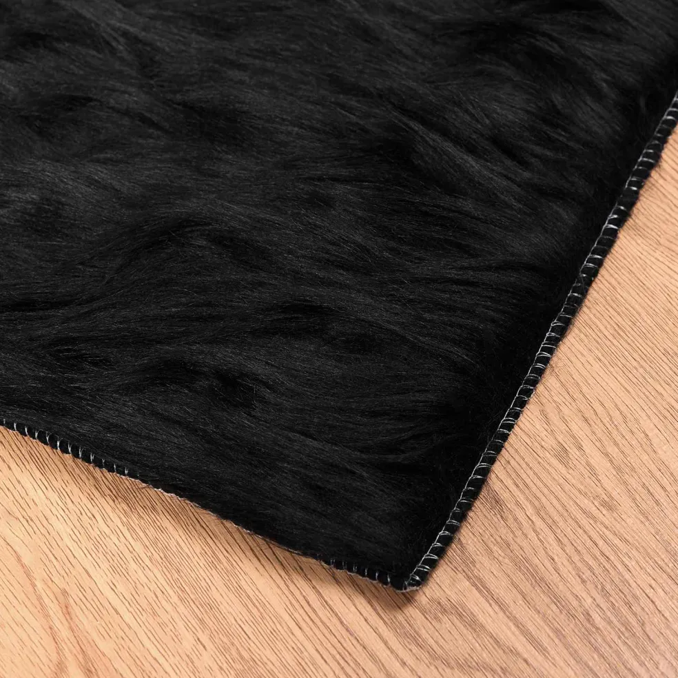 vidaXL Tapijt van imitatie TAFALLA Zwart 60 x 110 cm Polyester